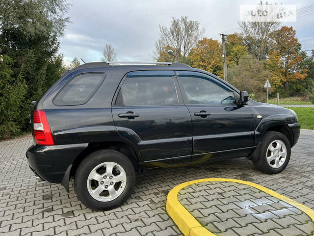 Черный Киа Sportage, объемом двигателя 1.98 л и пробегом 264 тыс. км за 6500 $, фото 31 на Automoto.ua