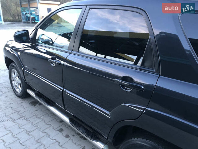 Черный Киа Sportage, объемом двигателя 2 л и пробегом 290 тыс. км за 7200 $, фото 7 на Automoto.ua