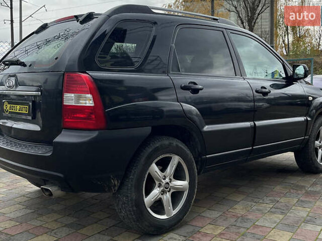 Черный Киа Sportage, объемом двигателя 1.98 л и пробегом 293 тыс. км за 6600 $, фото 6 на Automoto.ua