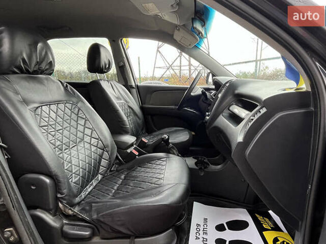 Черный Киа Sportage, объемом двигателя 1.98 л и пробегом 293 тыс. км за 6600 $, фото 20 на Automoto.ua