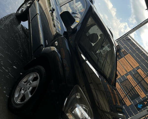 Черный Киа Sportage, объемом двигателя 2 л и пробегом 150 тыс. км за 10000 $, фото 17 на Automoto.ua