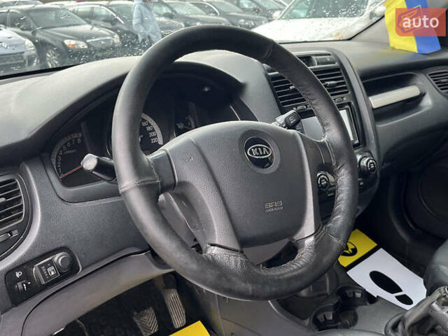 Черный Киа Sportage, объемом двигателя 1.98 л и пробегом 293 тыс. км за 6600 $, фото 15 на Automoto.ua