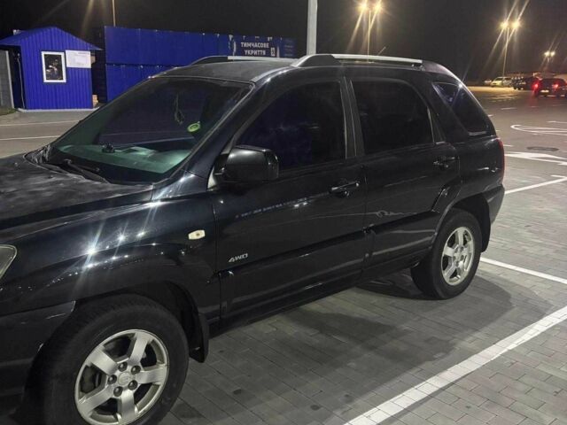 Черный Киа Sportage, объемом двигателя 2 л и пробегом 263 тыс. км за 6700 $, фото 1 на Automoto.ua