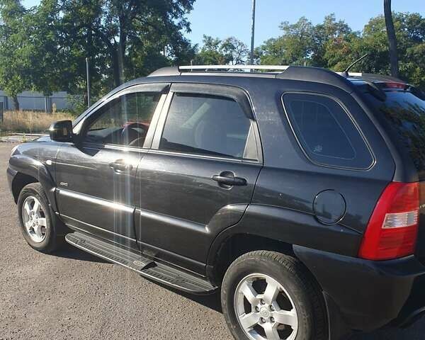 Чорний Кіа Sportage, об'ємом двигуна 2 л та пробігом 290 тис. км за 8200 $, фото 9 на Automoto.ua