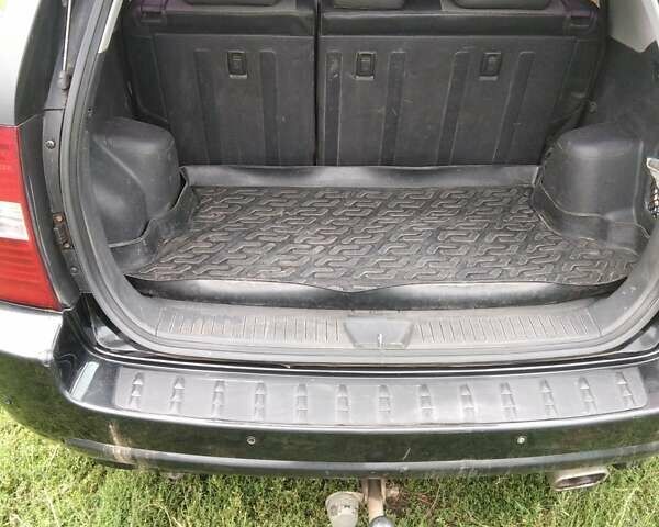 Чорний Кіа Sportage, об'ємом двигуна 2 л та пробігом 248 тис. км за 8600 $, фото 11 на Automoto.ua