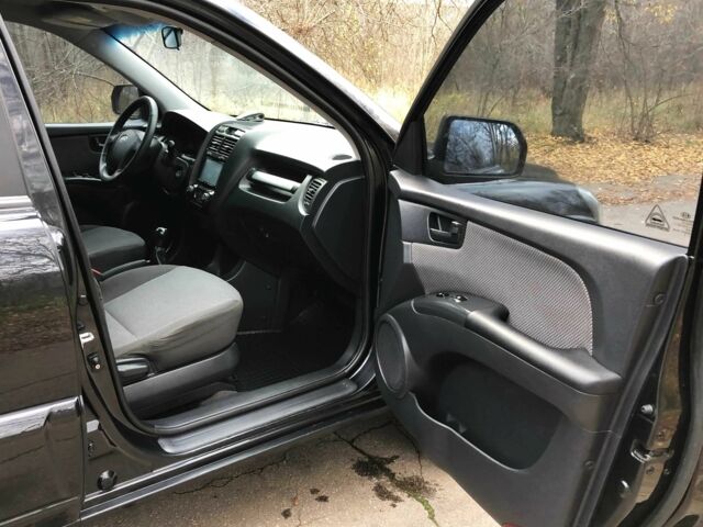 Черный Киа Sportage, объемом двигателя 2 л и пробегом 155 тыс. км за 7700 $, фото 12 на Automoto.ua