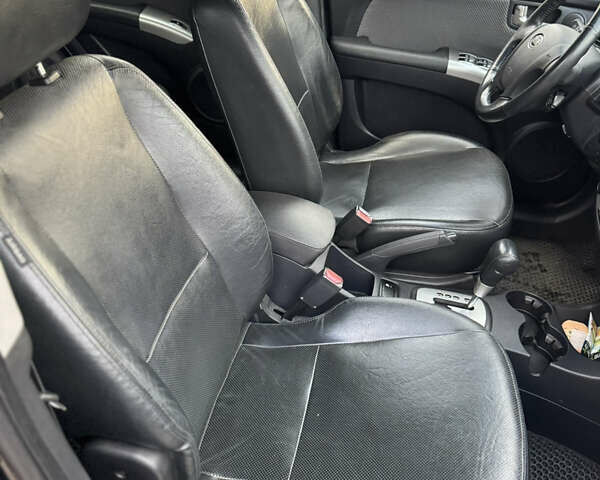 Чорний Кіа Sportage, об'ємом двигуна 1.99 л та пробігом 257 тис. км за 8500 $, фото 33 на Automoto.ua