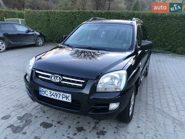 Черный Киа Sportage, объемом двигателя 2 л и пробегом 290 тыс. км за 7200 $, фото 1 на Automoto.ua