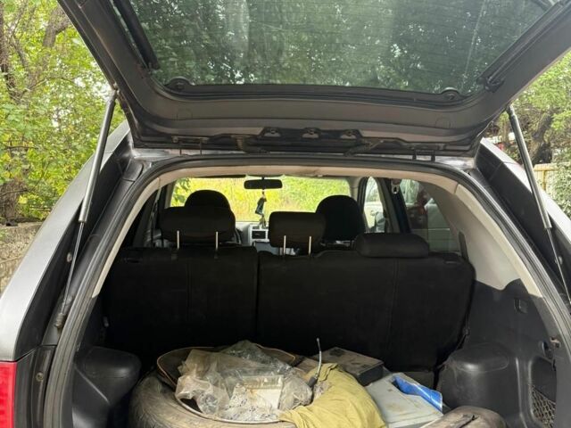 Черный Киа Sportage, объемом двигателя 2.7 л и пробегом 217 тыс. км за 6800 $, фото 4 на Automoto.ua