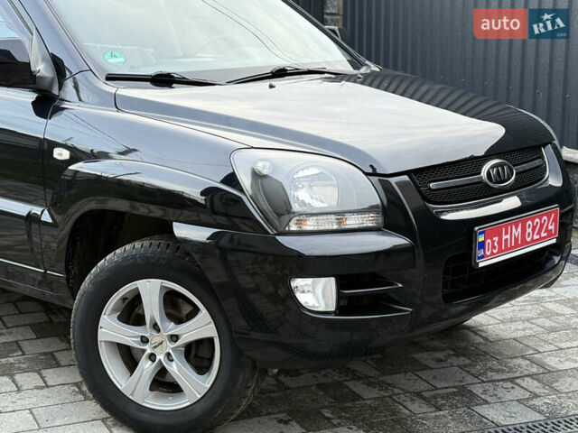 Чорний Кіа Sportage, об'ємом двигуна 2 л та пробігом 215 тис. км за 8600 $, фото 15 на Automoto.ua
