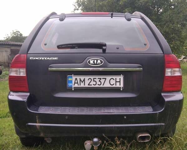 Чорний Кіа Sportage, об'ємом двигуна 2 л та пробігом 248 тис. км за 8600 $, фото 1 на Automoto.ua