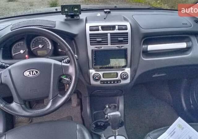 Черный Киа Sportage, объемом двигателя 2 л и пробегом 275 тыс. км за 7600 $, фото 2 на Automoto.ua