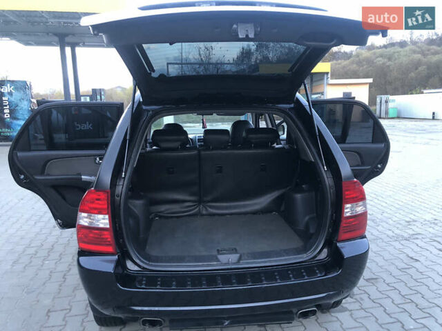 Черный Киа Sportage, объемом двигателя 2 л и пробегом 290 тыс. км за 7200 $, фото 16 на Automoto.ua