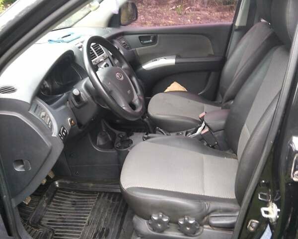 Чорний Кіа Sportage, об'ємом двигуна 2 л та пробігом 248 тис. км за 8600 $, фото 3 на Automoto.ua