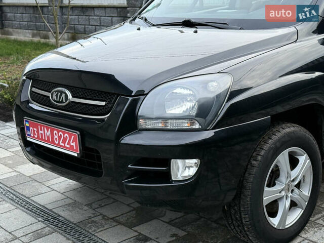 Чорний Кіа Sportage, об'ємом двигуна 2 л та пробігом 215 тис. км за 8600 $, фото 18 на Automoto.ua