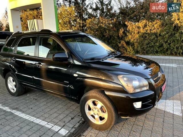 Черный Киа Sportage, объемом двигателя 2 л и пробегом 226 тыс. км за 8800 $, фото 4 на Automoto.ua