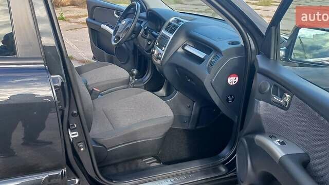 Чорний Кіа Sportage, об'ємом двигуна 2 л та пробігом 167 тис. км за 8999 $, фото 32 на Automoto.ua