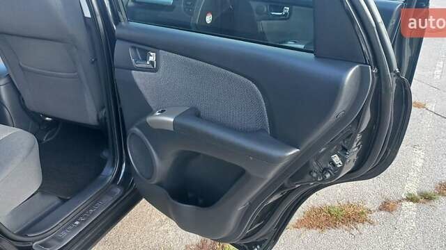 Чорний Кіа Sportage, об'ємом двигуна 2 л та пробігом 167 тис. км за 8999 $, фото 39 на Automoto.ua