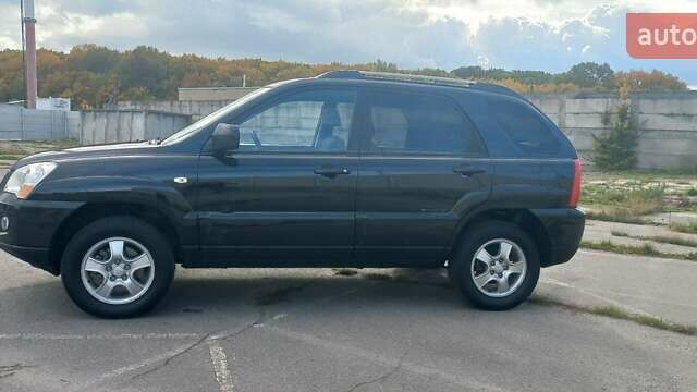 Чорний Кіа Sportage, об'ємом двигуна 2 л та пробігом 167 тис. км за 8999 $, фото 4 на Automoto.ua