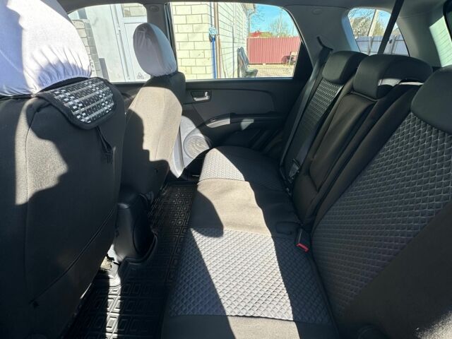 Черный Киа Sportage, объемом двигателя 2 л и пробегом 195 тыс. км за 9000 $, фото 9 на Automoto.ua