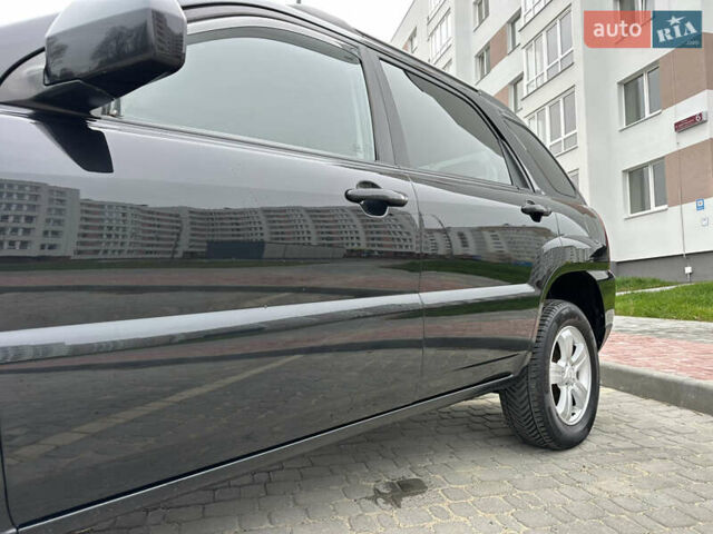 Черный Киа Sportage, объемом двигателя 2 л и пробегом 157 тыс. км за 8999 $, фото 14 на Automoto.ua