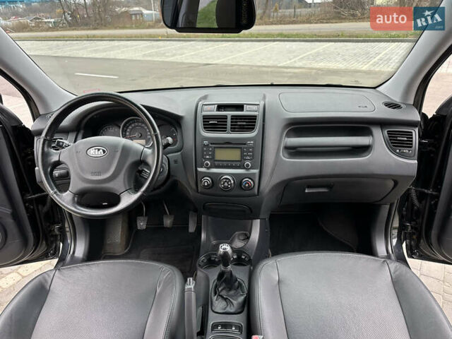 Черный Киа Sportage, объемом двигателя 2 л и пробегом 157 тыс. км за 8999 $, фото 24 на Automoto.ua