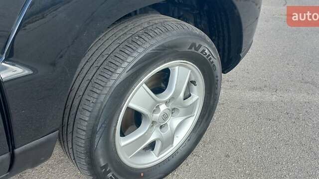 Чорний Кіа Sportage, об'ємом двигуна 2 л та пробігом 167 тис. км за 8999 $, фото 16 на Automoto.ua