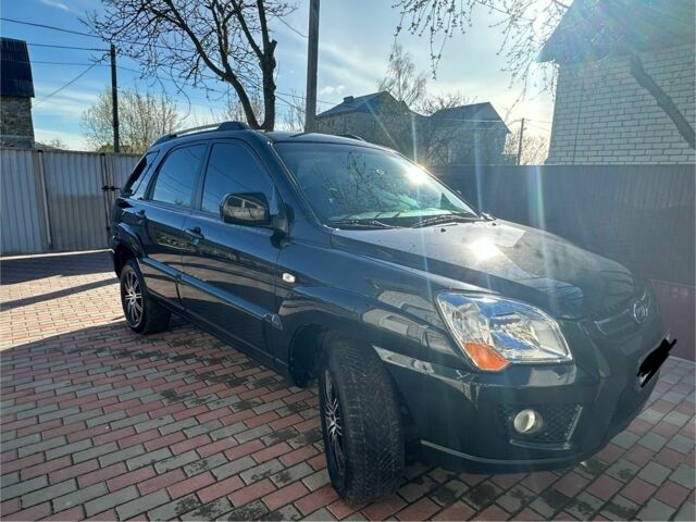 Черный Киа Sportage, объемом двигателя 2 л и пробегом 195 тыс. км за 9000 $, фото 1 на Automoto.ua