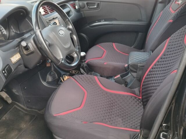 Черный Киа Sportage, объемом двигателя 2 л и пробегом 245 тыс. км за 8000 $, фото 6 на Automoto.ua