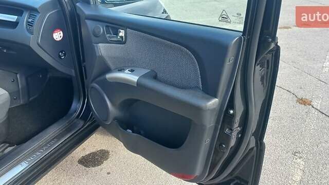 Чорний Кіа Sportage, об'ємом двигуна 2 л та пробігом 167 тис. км за 8999 $, фото 24 на Automoto.ua