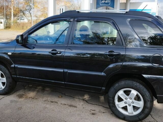 Черный Киа Sportage, объемом двигателя 2 л и пробегом 245 тыс. км за 8000 $, фото 3 на Automoto.ua