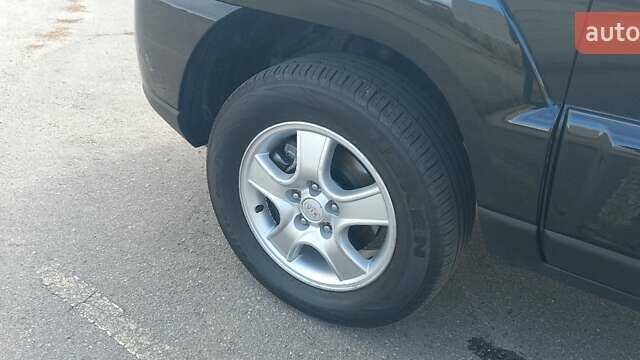 Чорний Кіа Sportage, об'ємом двигуна 2 л та пробігом 167 тис. км за 8999 $, фото 14 на Automoto.ua