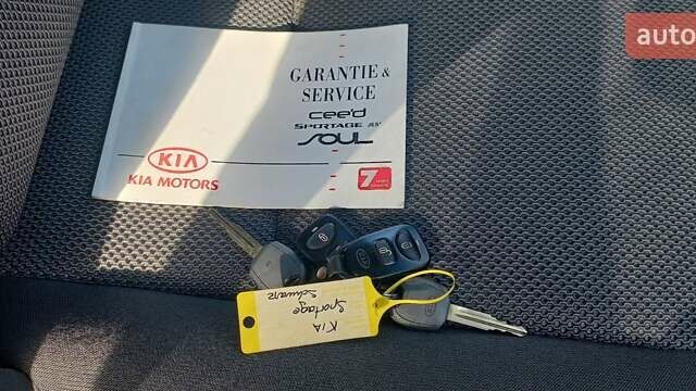 Чорний Кіа Sportage, об'ємом двигуна 2 л та пробігом 167 тис. км за 8999 $, фото 59 на Automoto.ua