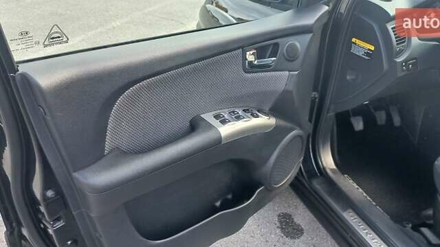 Чорний Кіа Sportage, об'ємом двигуна 2 л та пробігом 167 тис. км за 8999 $, фото 17 на Automoto.ua