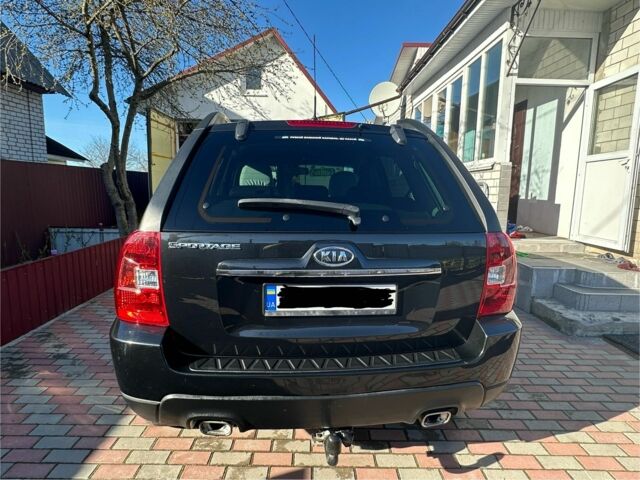 Черный Киа Sportage, объемом двигателя 2 л и пробегом 195 тыс. км за 9000 $, фото 3 на Automoto.ua