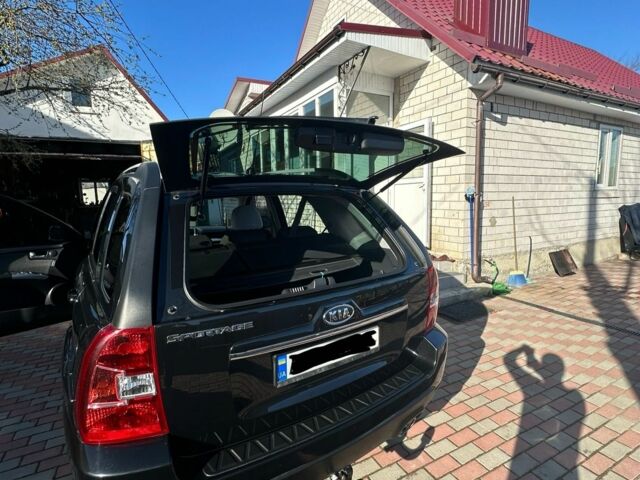 Черный Киа Sportage, объемом двигателя 2 л и пробегом 195 тыс. км за 9000 $, фото 8 на Automoto.ua