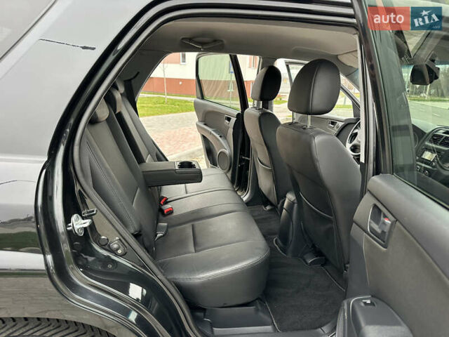 Черный Киа Sportage, объемом двигателя 2 л и пробегом 157 тыс. км за 8999 $, фото 23 на Automoto.ua
