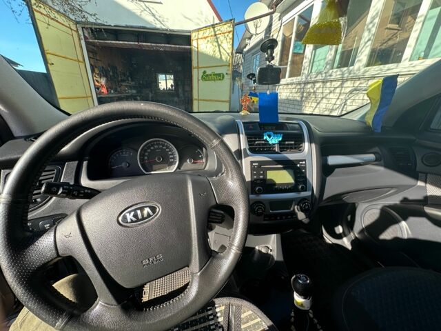 Черный Киа Sportage, объемом двигателя 2 л и пробегом 195 тыс. км за 9000 $, фото 5 на Automoto.ua