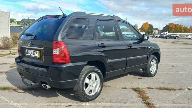Чорний Кіа Sportage, об'ємом двигуна 2 л та пробігом 167 тис. км за 8999 $, фото 2 на Automoto.ua