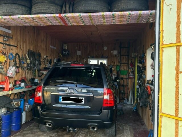 Черный Киа Sportage, объемом двигателя 2 л и пробегом 195 тыс. км за 9000 $, фото 10 на Automoto.ua