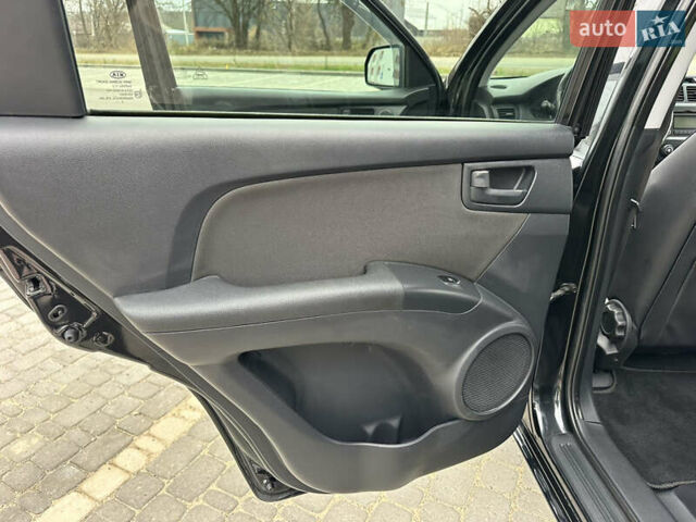 Черный Киа Sportage, объемом двигателя 2 л и пробегом 157 тыс. км за 8999 $, фото 35 на Automoto.ua