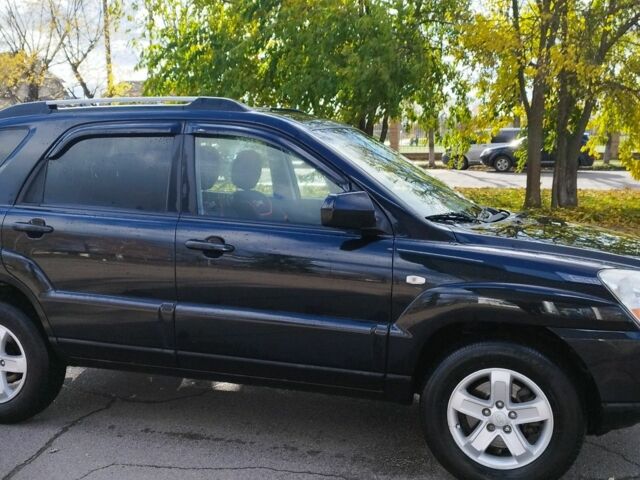 Черный Киа Sportage, объемом двигателя 2 л и пробегом 245 тыс. км за 8000 $, фото 2 на Automoto.ua