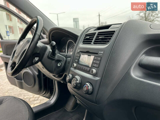 Черный Киа Sportage, объемом двигателя 2 л и пробегом 157 тыс. км за 8999 $, фото 20 на Automoto.ua