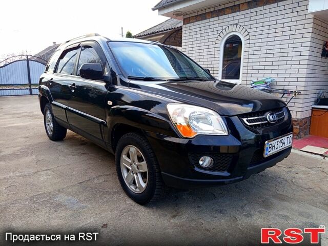 Черный Киа Sportage, объемом двигателя 2 л и пробегом 290 тыс. км за 9100 $, фото 2 на Automoto.ua