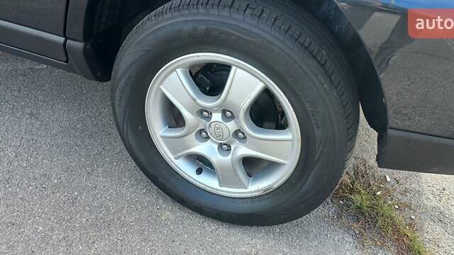 Чорний Кіа Sportage, об'ємом двигуна 2 л та пробігом 167 тис. км за 8999 $, фото 15 на Automoto.ua