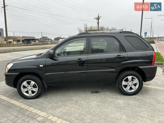 Черный Киа Sportage, объемом двигателя 2 л и пробегом 157 тыс. км за 8999 $, фото 16 на Automoto.ua