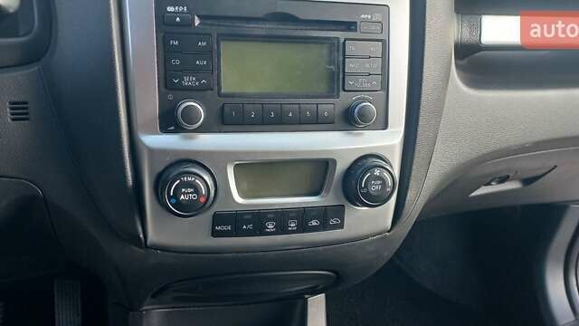 Чорний Кіа Sportage, об'ємом двигуна 2 л та пробігом 167 тис. км за 8999 $, фото 22 на Automoto.ua