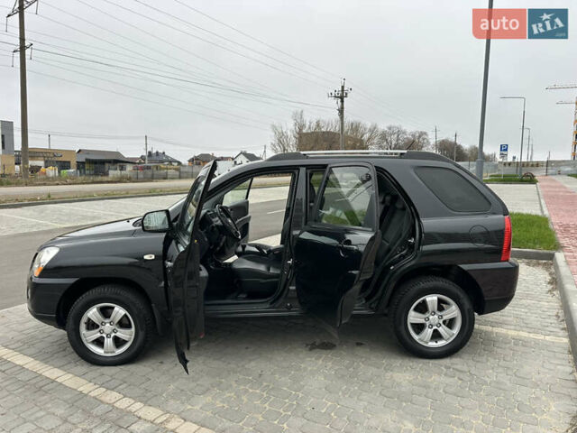 Черный Киа Sportage, объемом двигателя 2 л и пробегом 157 тыс. км за 8999 $, фото 32 на Automoto.ua