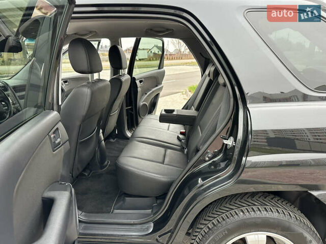 Черный Киа Sportage, объемом двигателя 2 л и пробегом 157 тыс. км за 8999 $, фото 34 на Automoto.ua