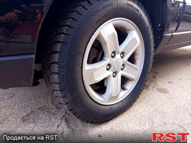 Черный Киа Sportage, объемом двигателя 2 л и пробегом 290 тыс. км за 9100 $, фото 11 на Automoto.ua